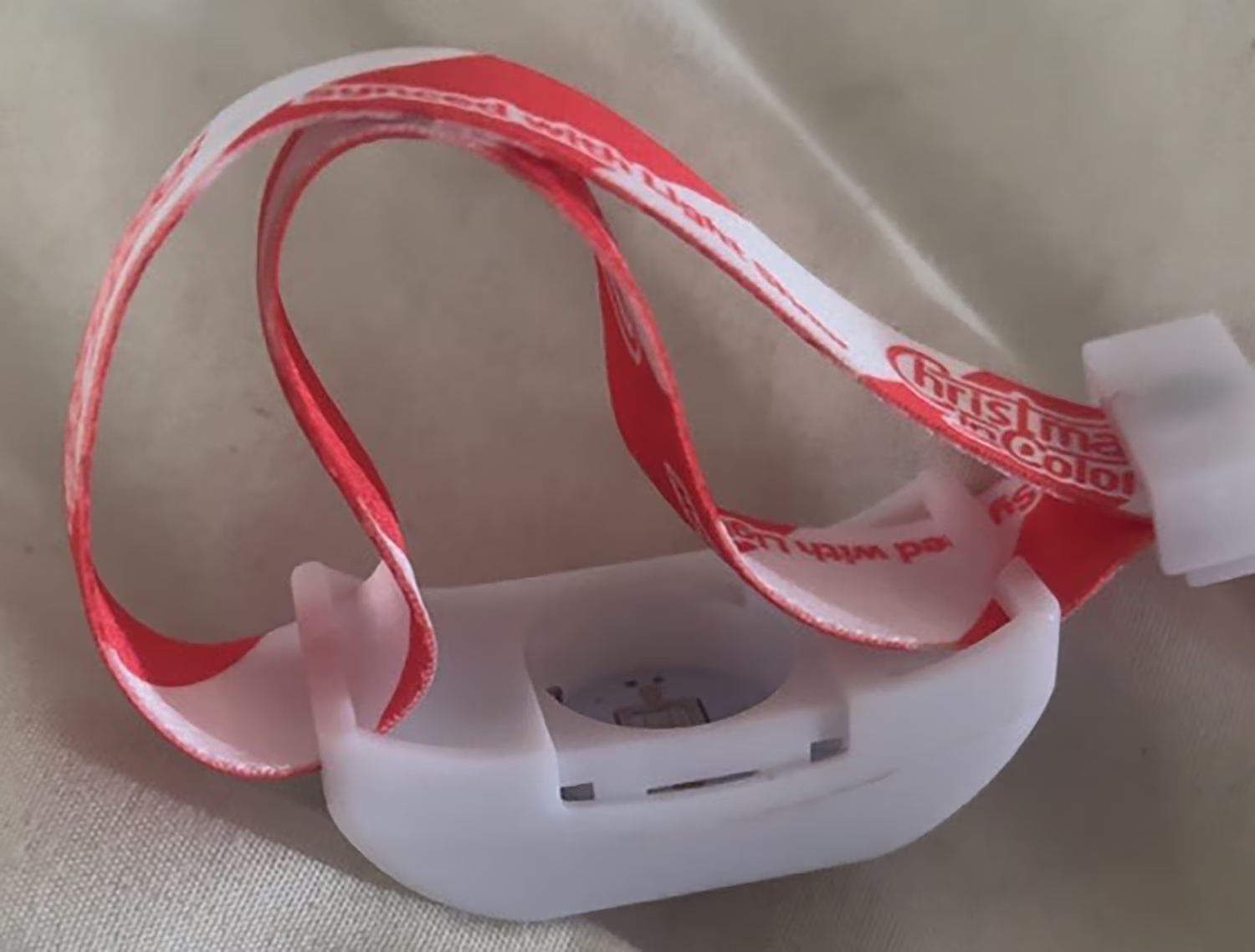 Jess Sandoval says her daughter Elana swallowed a small battery that was in a bracelet they received from a drive-through Christmas light show.