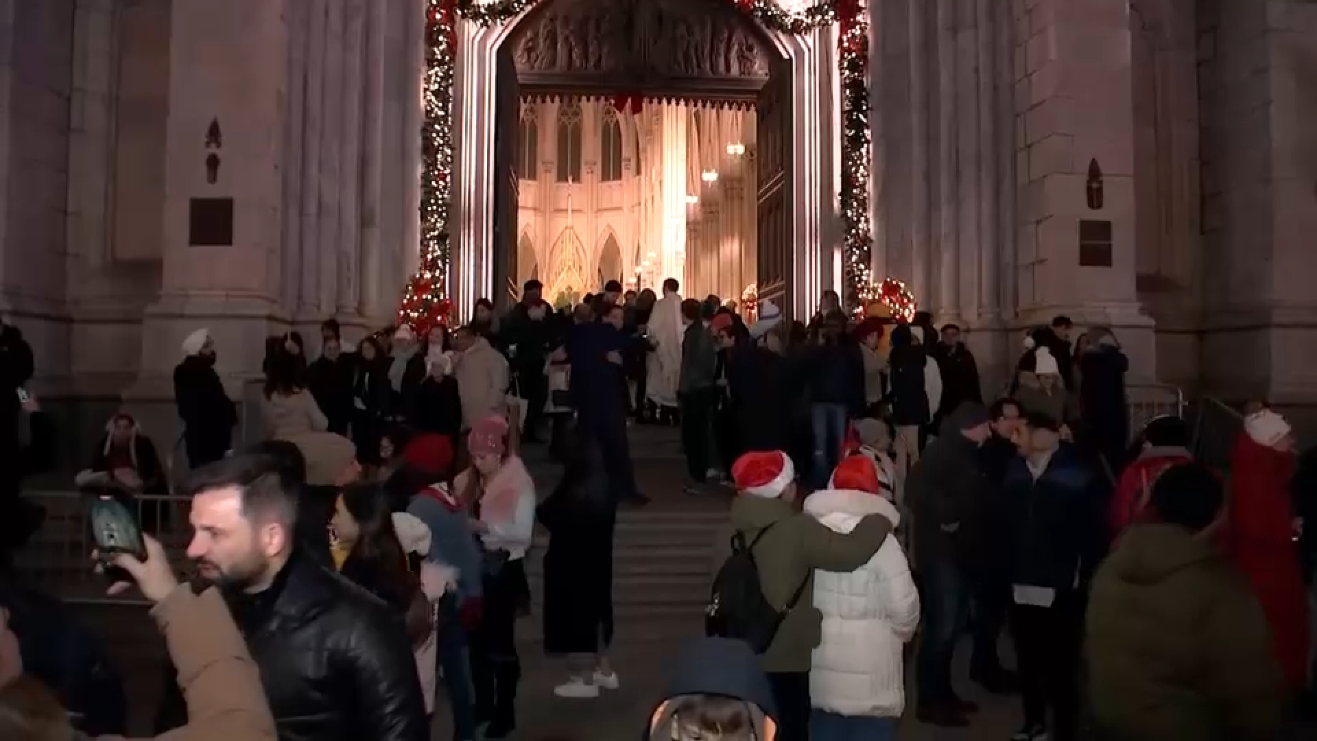 Crowds gather at St. Patrick's Cathedral for Cardinal Dolan's final midnight mass