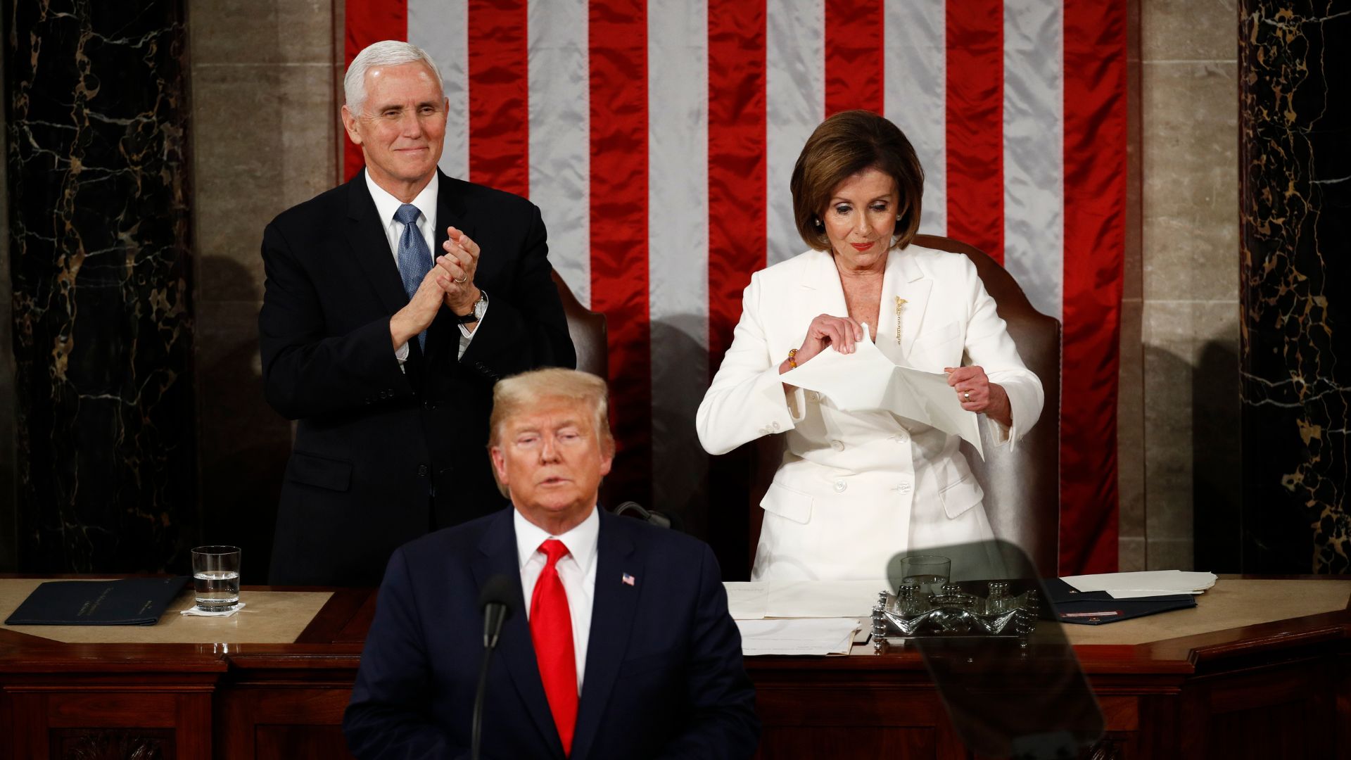 House Speaker Nancy Pelosi of Calif., tears her copy of President Donald Trump's s State of the Union address after he delivered it to a joint session of Congress, Feb. 4, 2020.