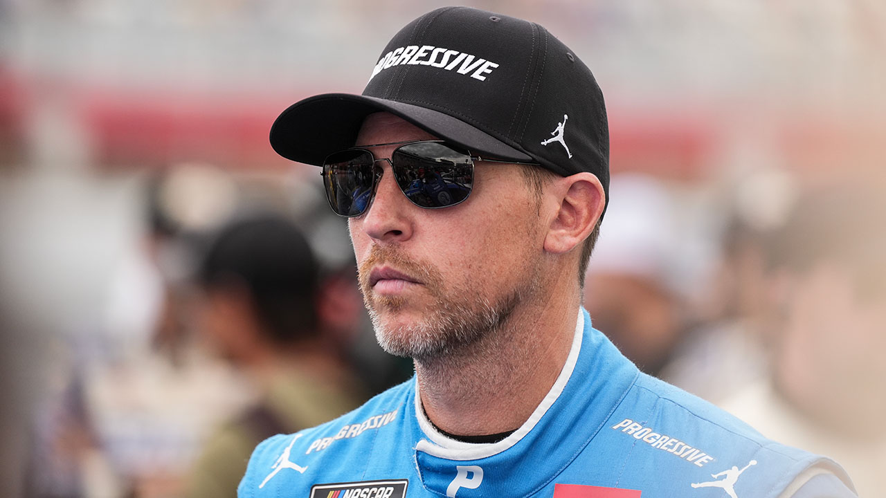 Denny Hamlin looks on before a NASCAR Cup Series auto race at Charlotte Motor Speedway, Sunday, Oct. 5, 2025, in Concord.