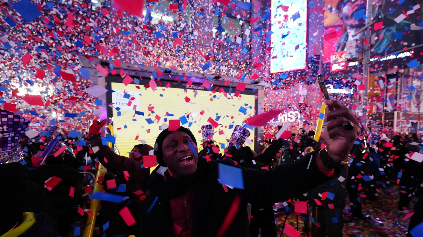 Crowds brave the cold in Times Square to ring in 2026