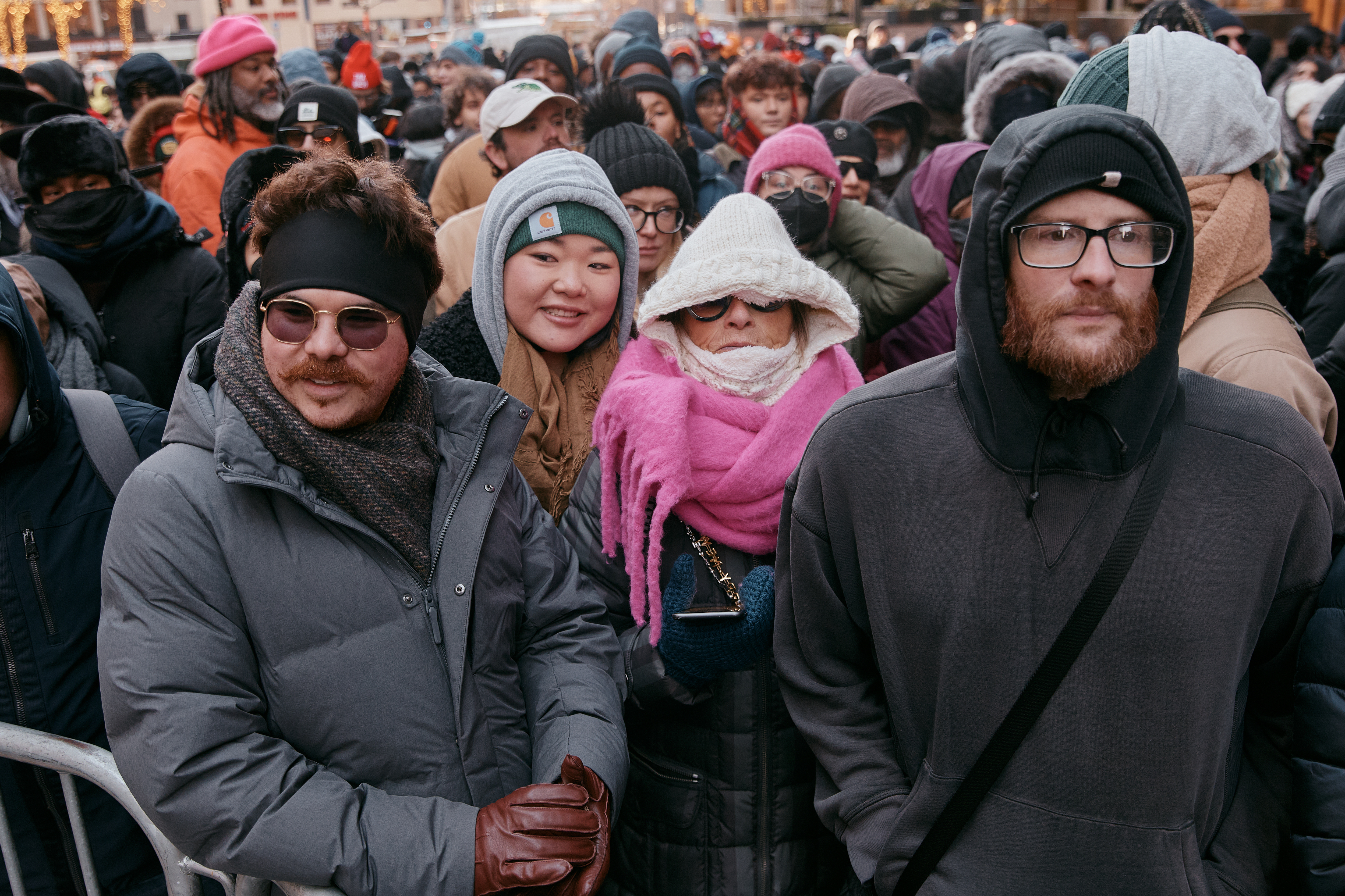 People wait in the cold near City Hall before Zohran Mamdani's inauguration as mayor on Thursday, Jan. 1, 2026, in New York. (AP Photo/Andres Kudacki)