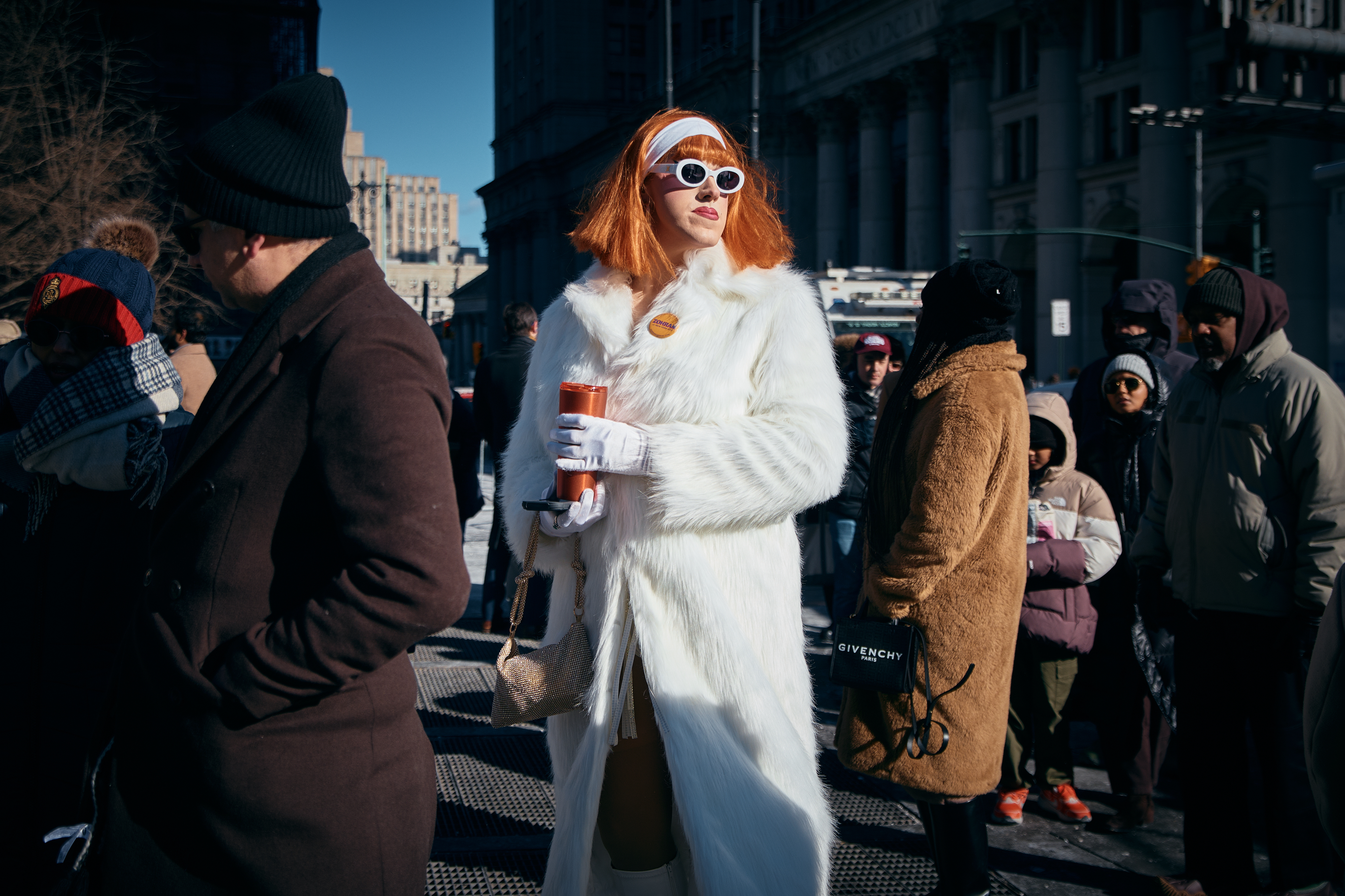 People wait in the cold outside the City Hall before Zohran Mamdani's inauguration on Thursday, Jan. 1, 2026, in New York. (AP Photo/Andres Kudacki)