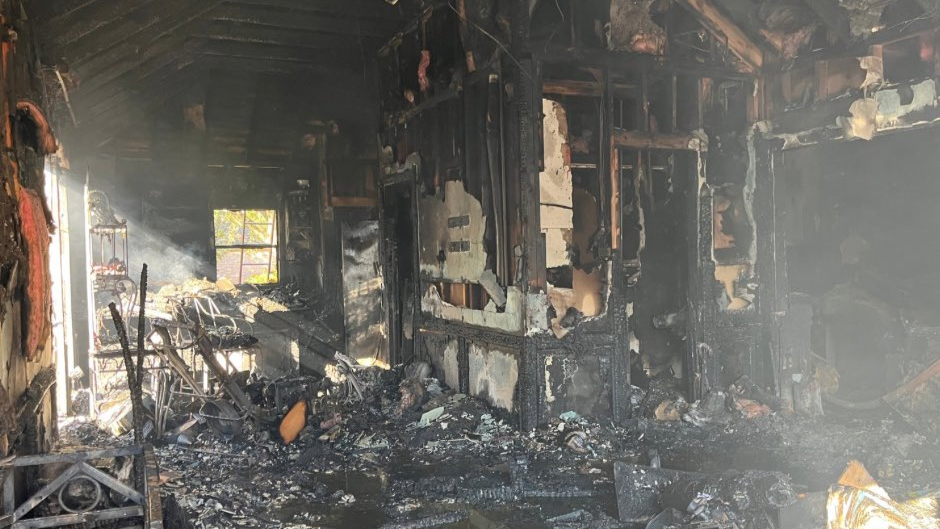 An image captured by the Houston Fire Department shows the aftermath of a deadly fire in the Briar Forest area, which left a home burned to the studs and joists.