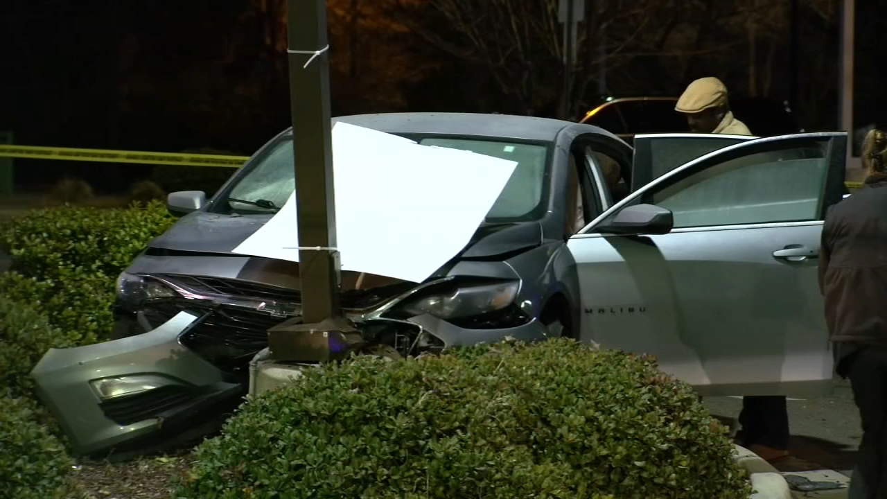 Driver killed, woman injured after shots fired from another car