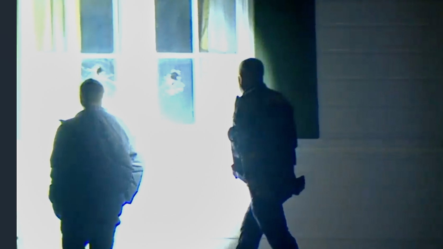 In this image taken from WCPO 9 News video shows officials inspecting broken windows and other property damage at Vice President JD Vance's Ohio home in eastern Cincinnati, Ohio.