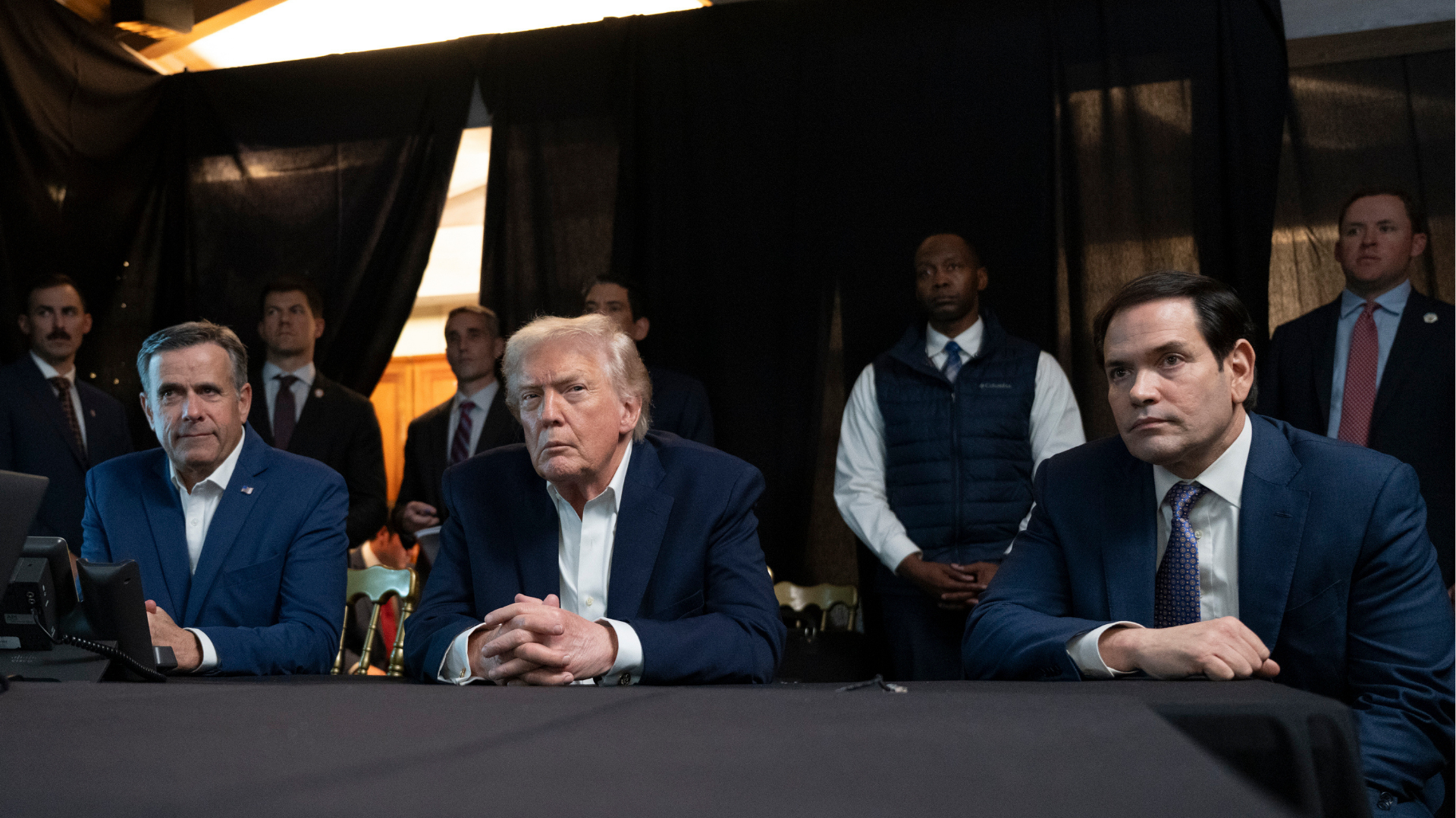 In this photo released by the White House, President Donald Trump monitors U.S. military operations in Venezuela, with CIA Director John Ratcliffe, left, and Secretary of State Marco Rubio at Mar-a-Lago in Palm Beach, Fla., Saturday, Jan. 3, 2026.
