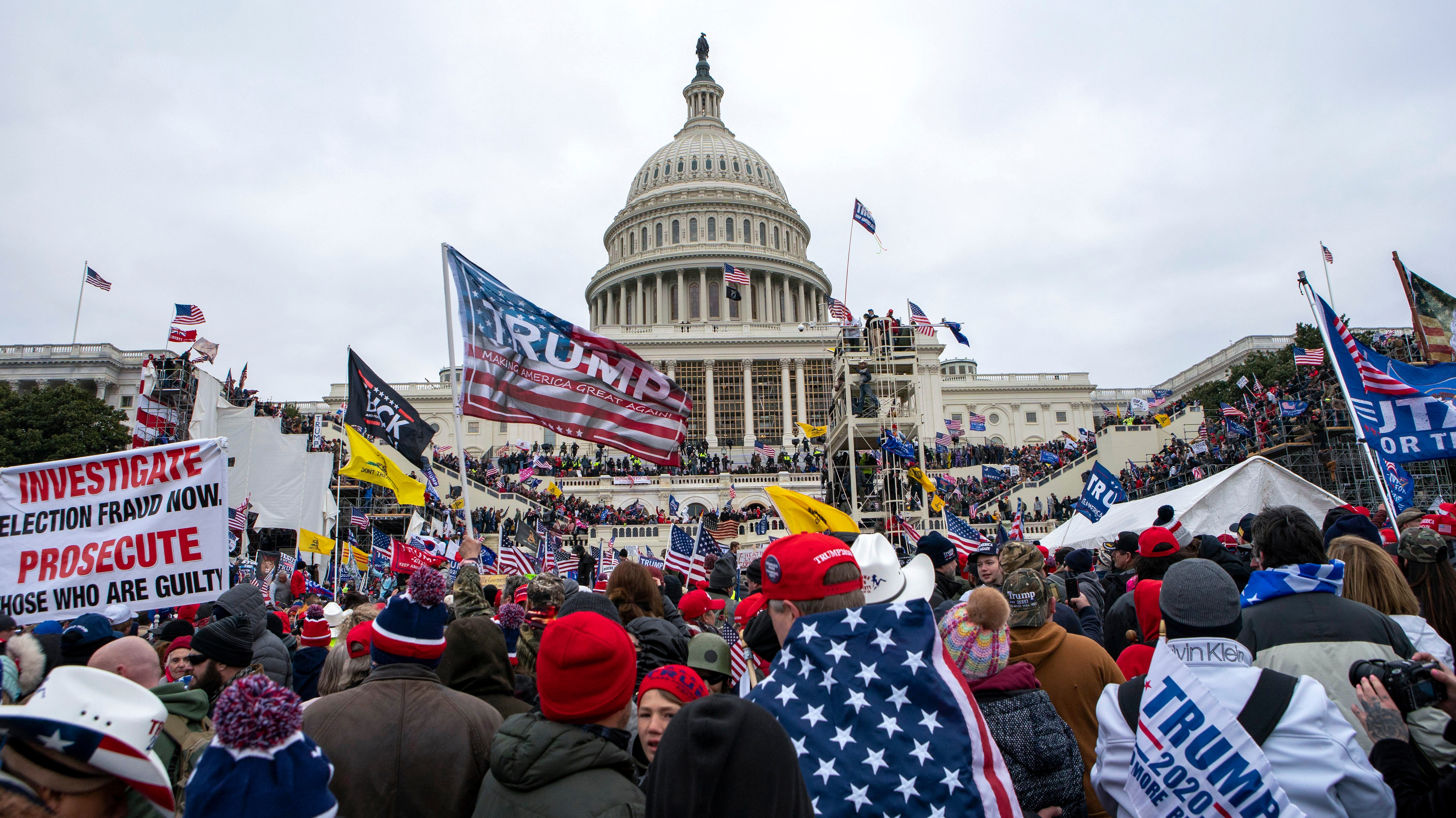 Rioters loyal to President Donald Trump rally at the U.S. Capitol in Washington, Jan. 6, 2021. 
