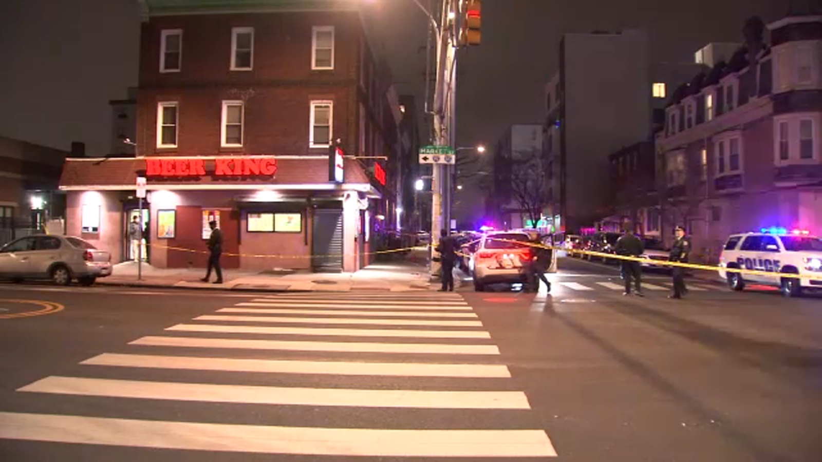 2 shot, including innocent bystander, outside beer distributor in West Philadelphia