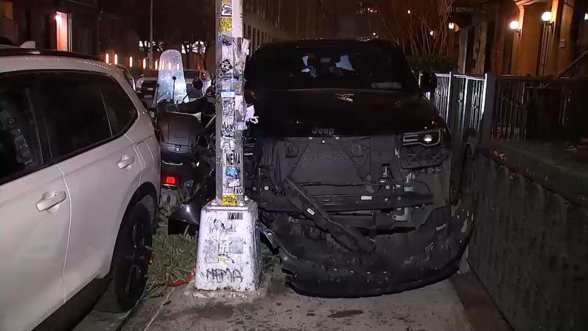 Midtown crash: Car jumps curb, hits parked cars and light pole