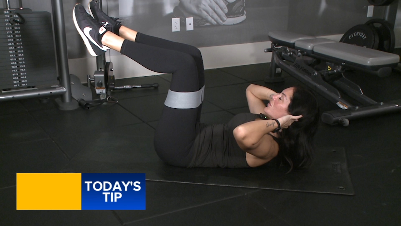 Fitness Tip: Adding resistance to your crunches to engage your core