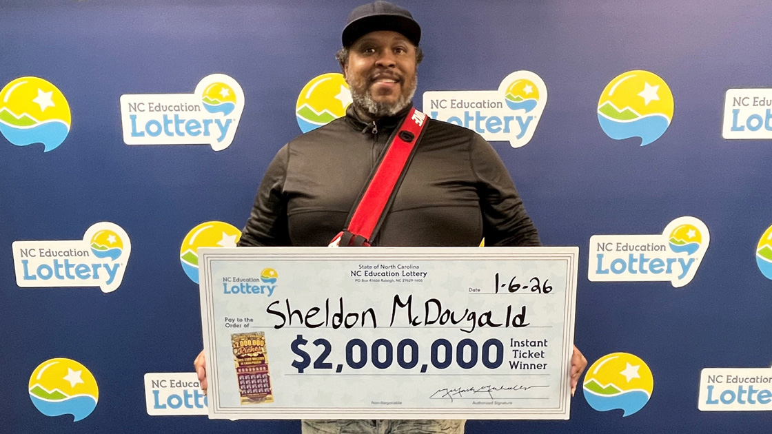 Sheldon McDougald collects his winnings.
