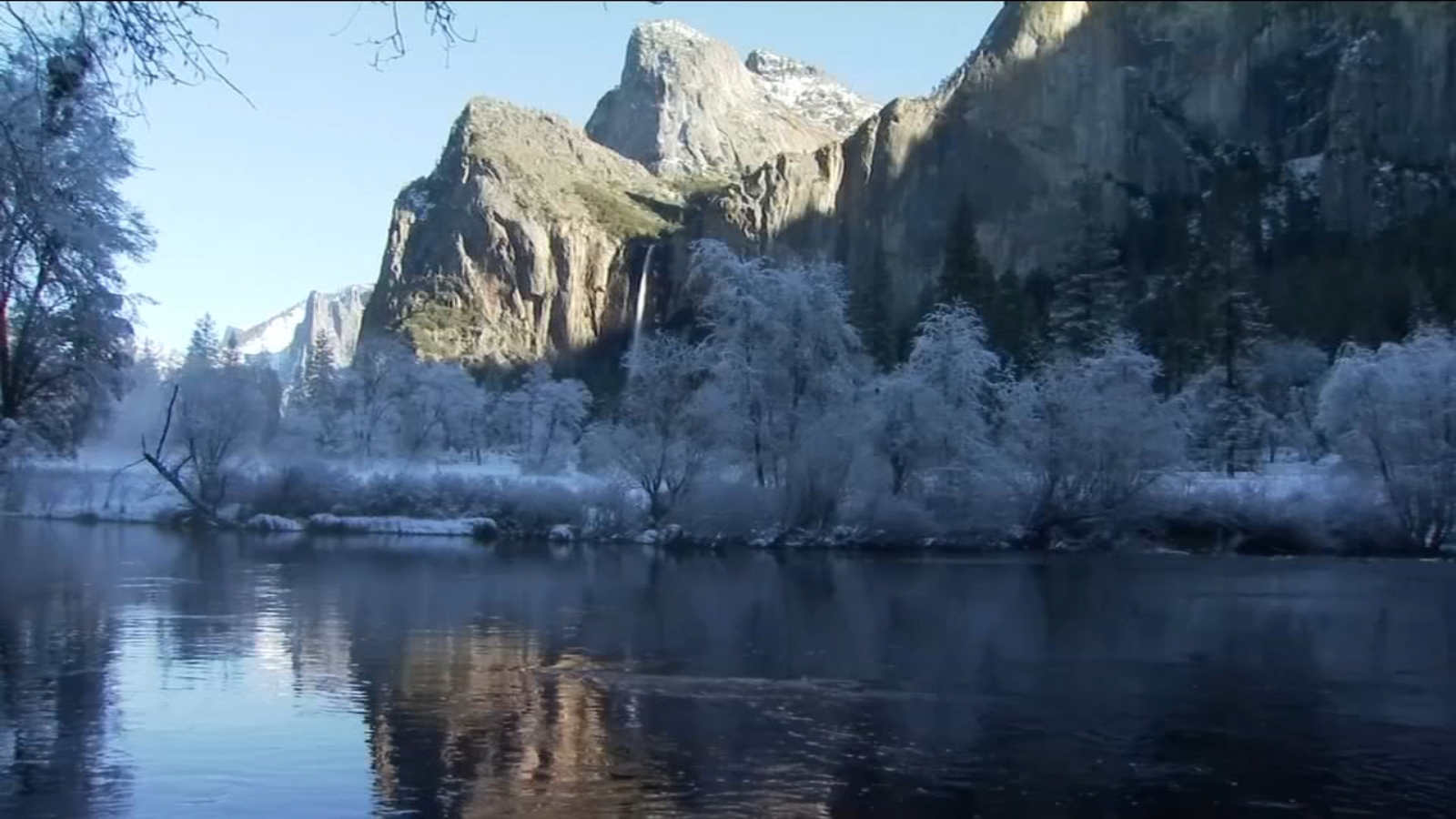Visitors enjoy snowy winter scenery in Yosemite