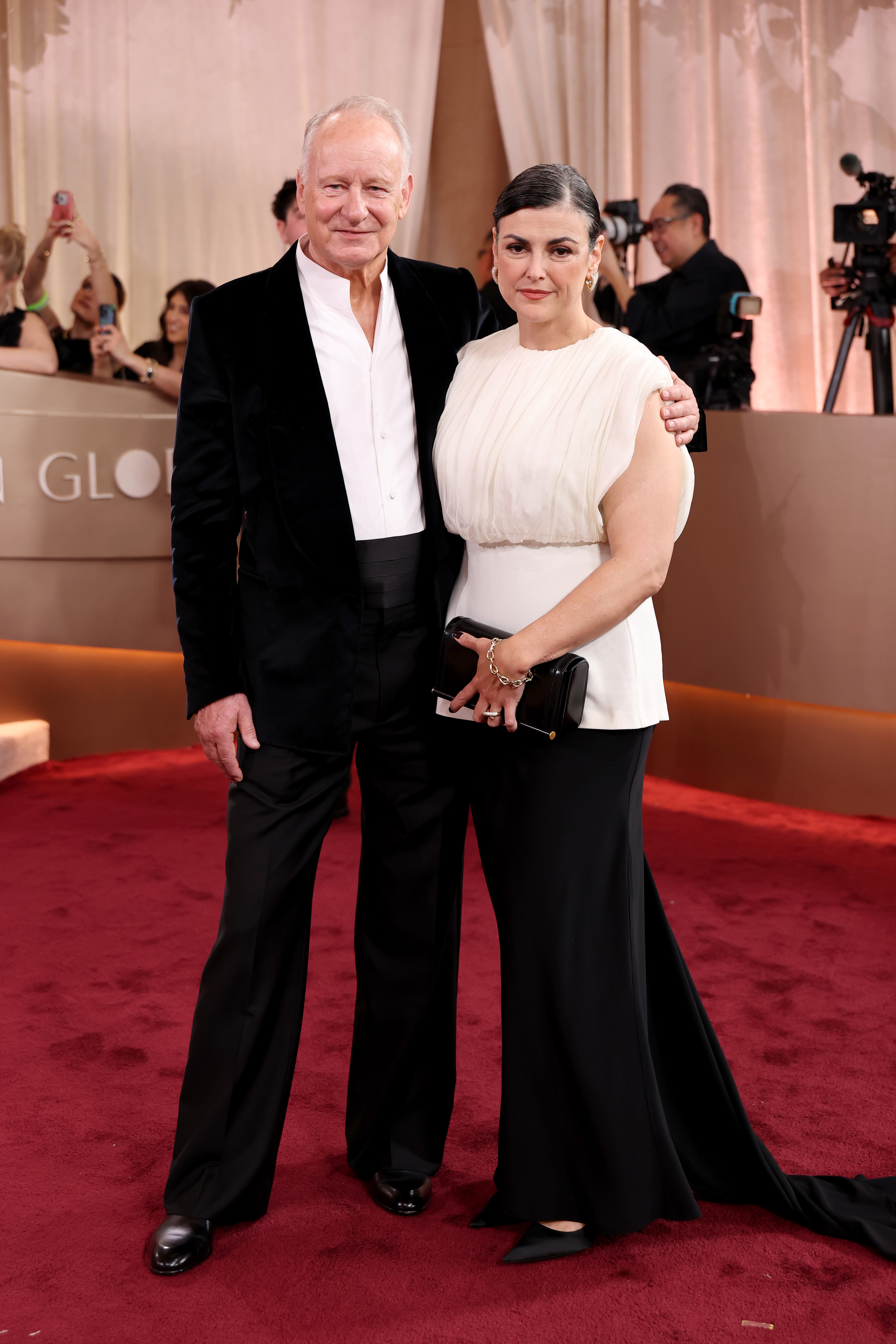 Stellan Skarsgård and Megan Everett-Skarsgård attend the 83rd annual Golden Globe Awards at The Beverly Hilton on January 11, 2026 in Beverly Hills, California.