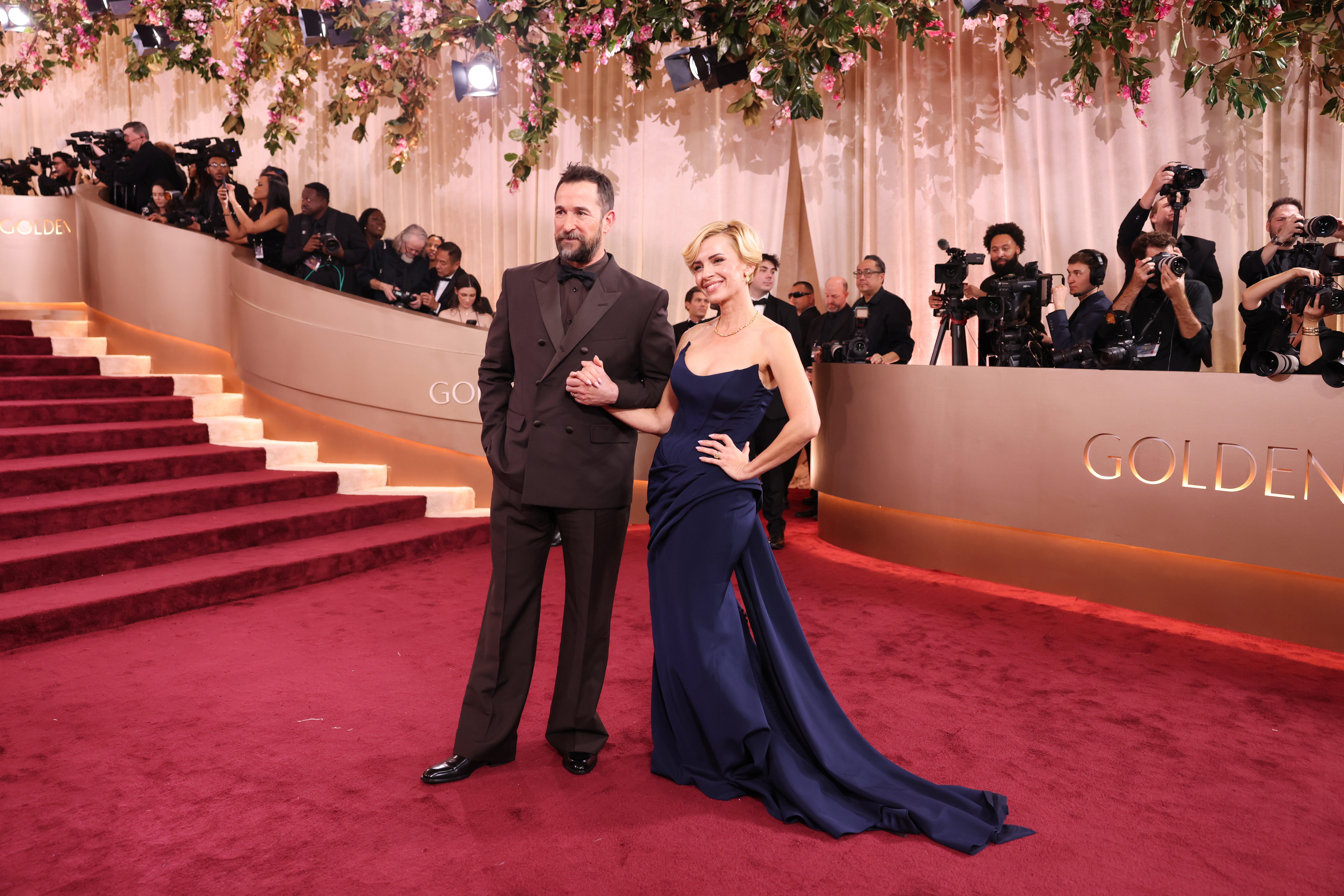 Sara Wells and Noah Wylie on the red carpet at the 2026 Golden Globes held at the Beverly Hilton in Beverly Hills, CA on Sunday, January 11, 2026.