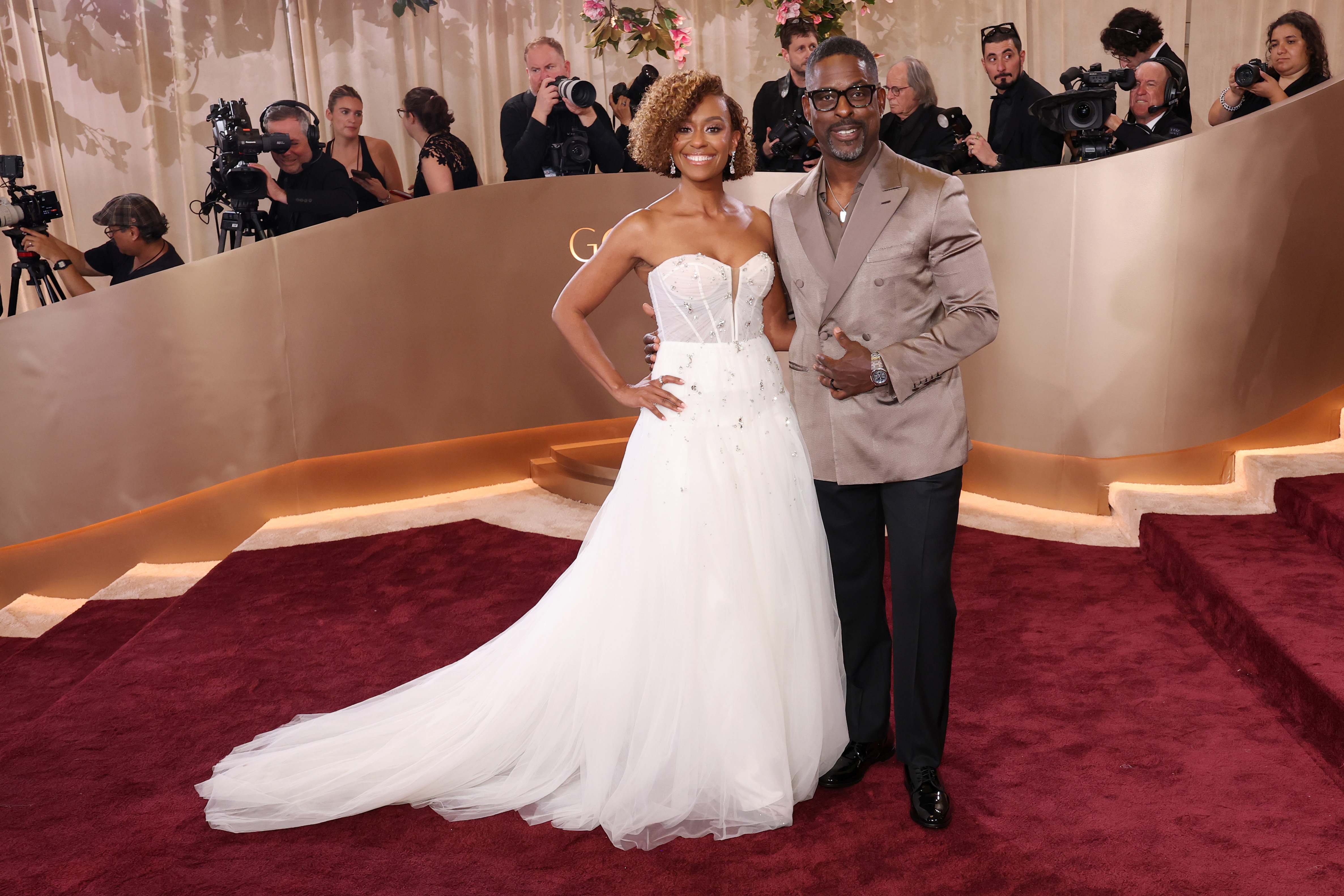 Ryan Michelle Bathe and Sterling K. Brown attend the 83rd Annual Golden Globe Awards at The Beverly Hilton on January 11, 2026 in Beverly Hills, California.