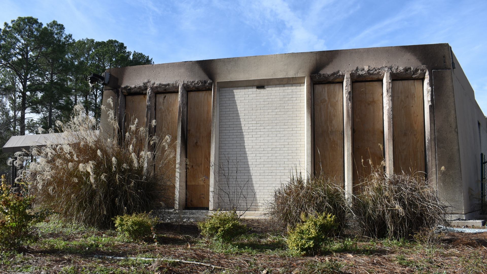 Boards cover the charred remains of the Beth Israel Congregation library, which was set on fire early Saturday morning, on Monday, Jan. 12, 2026, in Jackson, Mississippi.