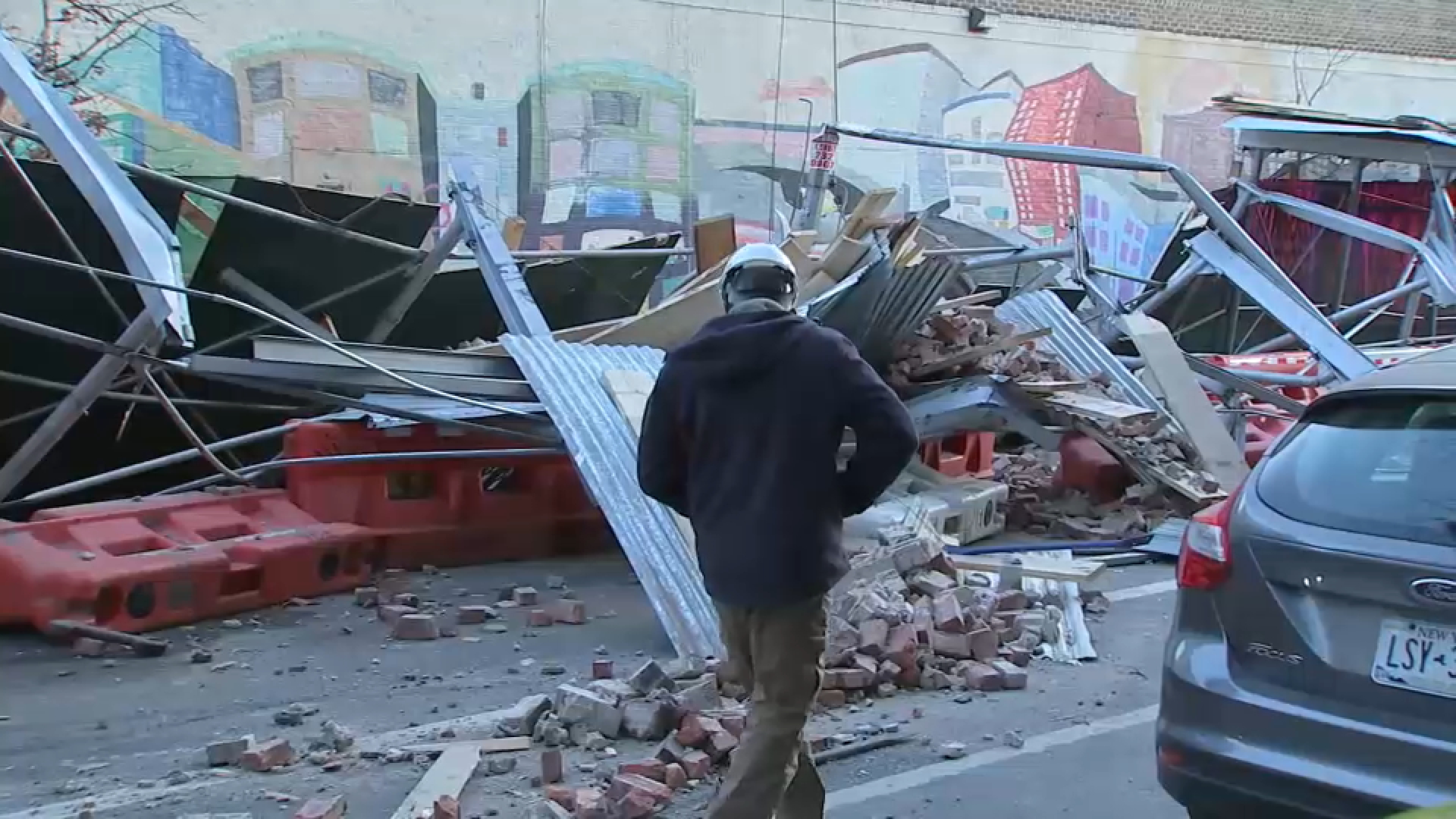 Section of vacant building collapses onto scaffolding below in the Bronx