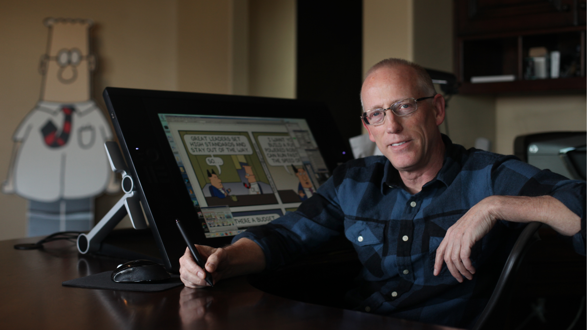 Scott Adams, cartoonist and author and creator of "Dilbert", poses for a portrait in his home office on Monday, January 6, 2014 in Pleasanton, Calif.