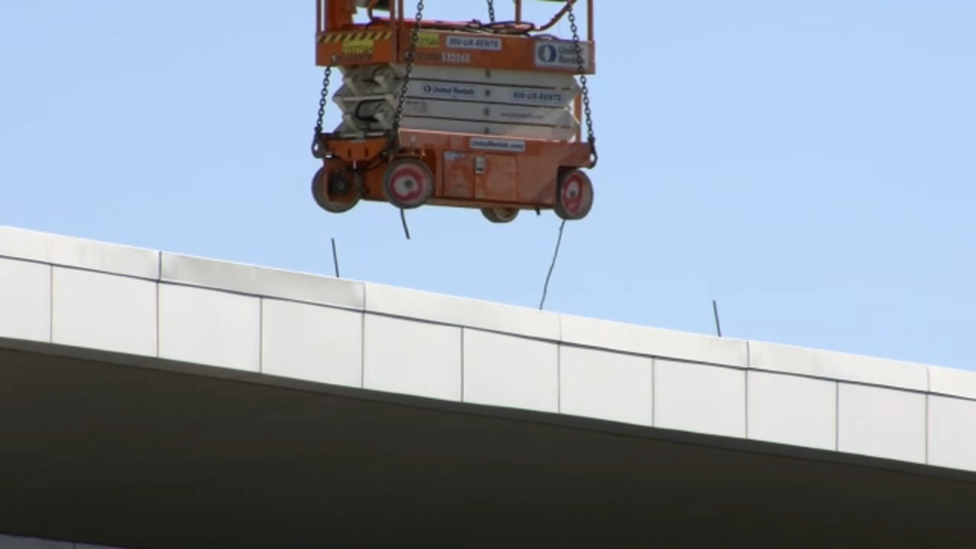 Crews remove fire-damaged items at the Raleigh Convention Center