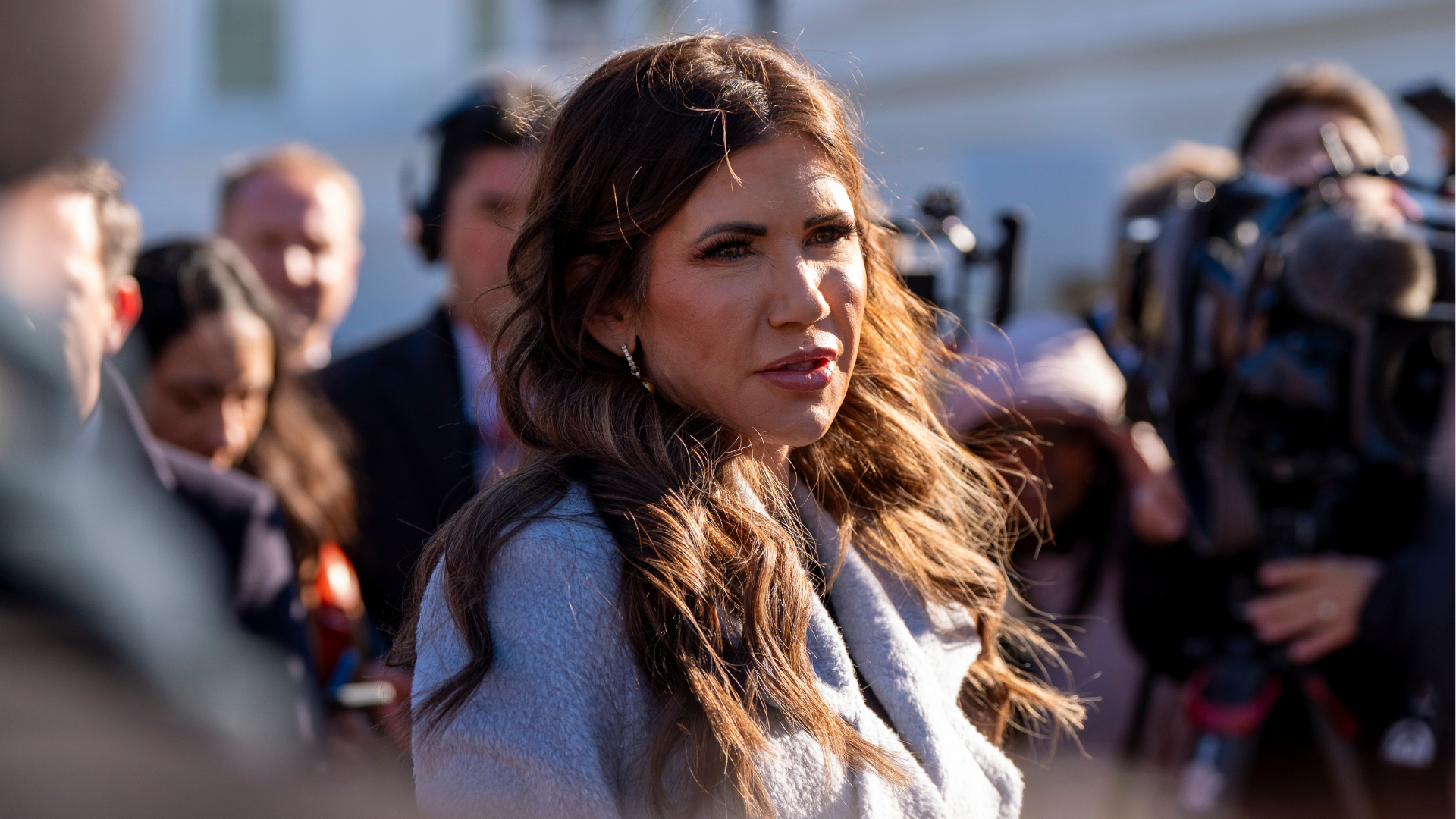 Homeland Security Secretary Kristi Noem speaks with reporters at the White House, Thursday, Jan. 15, 2026, in Washington.