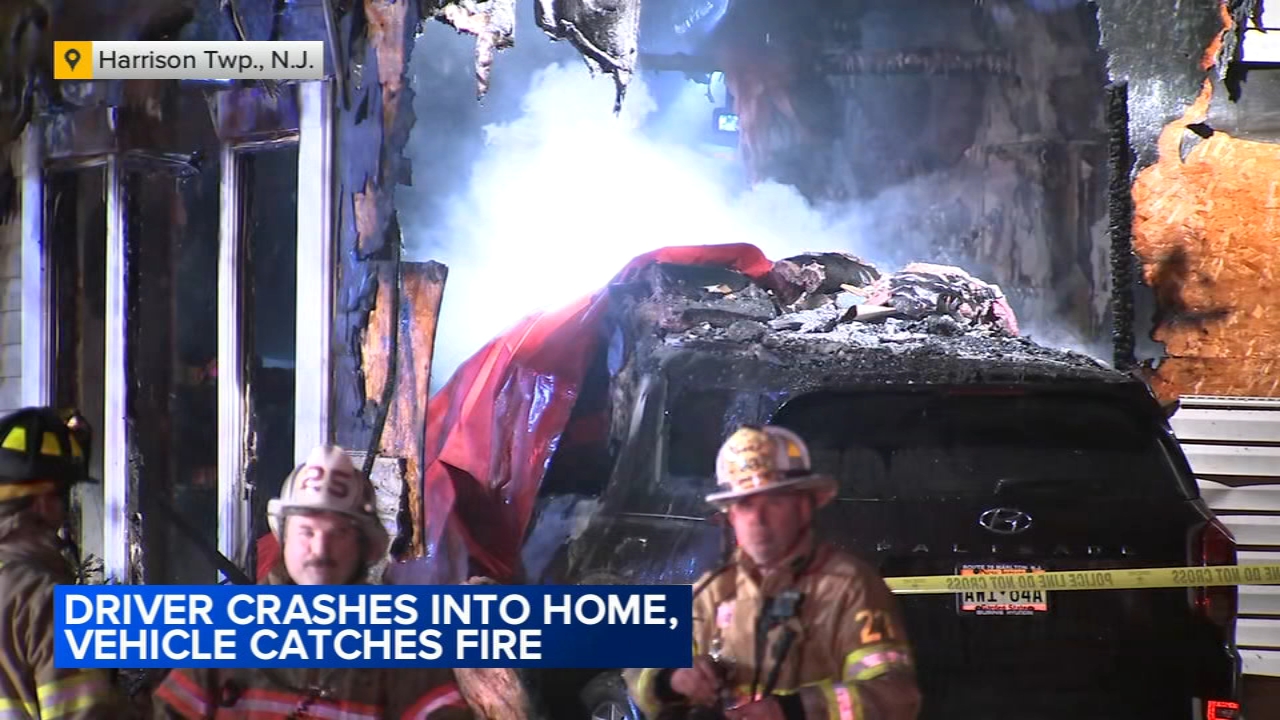 2 killed after SUV crashes into home and catches fire