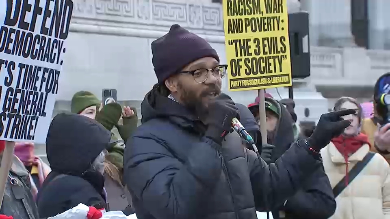 President Trump touts accomplishments one year in as rallies in NYC protest his policies
      