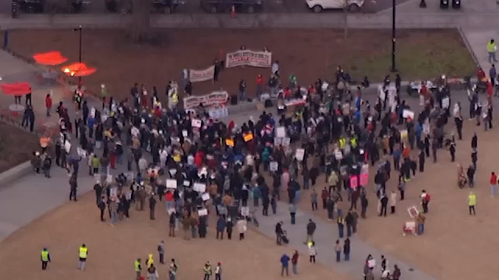 Hundreds gather in Moore Square, march in Raleigh opposing ICE, Trump administration
      