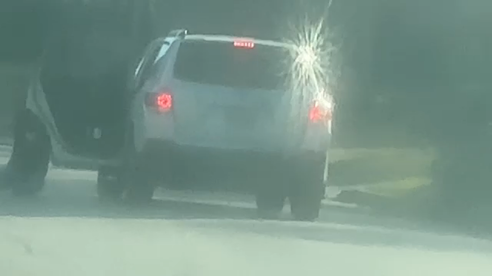 Caught on camera: Landscaper dragged down street by 3 robbery suspects
      