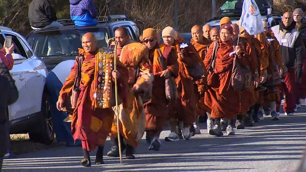 Monks on 2,000-mile peace journey walk through Chatham Co.