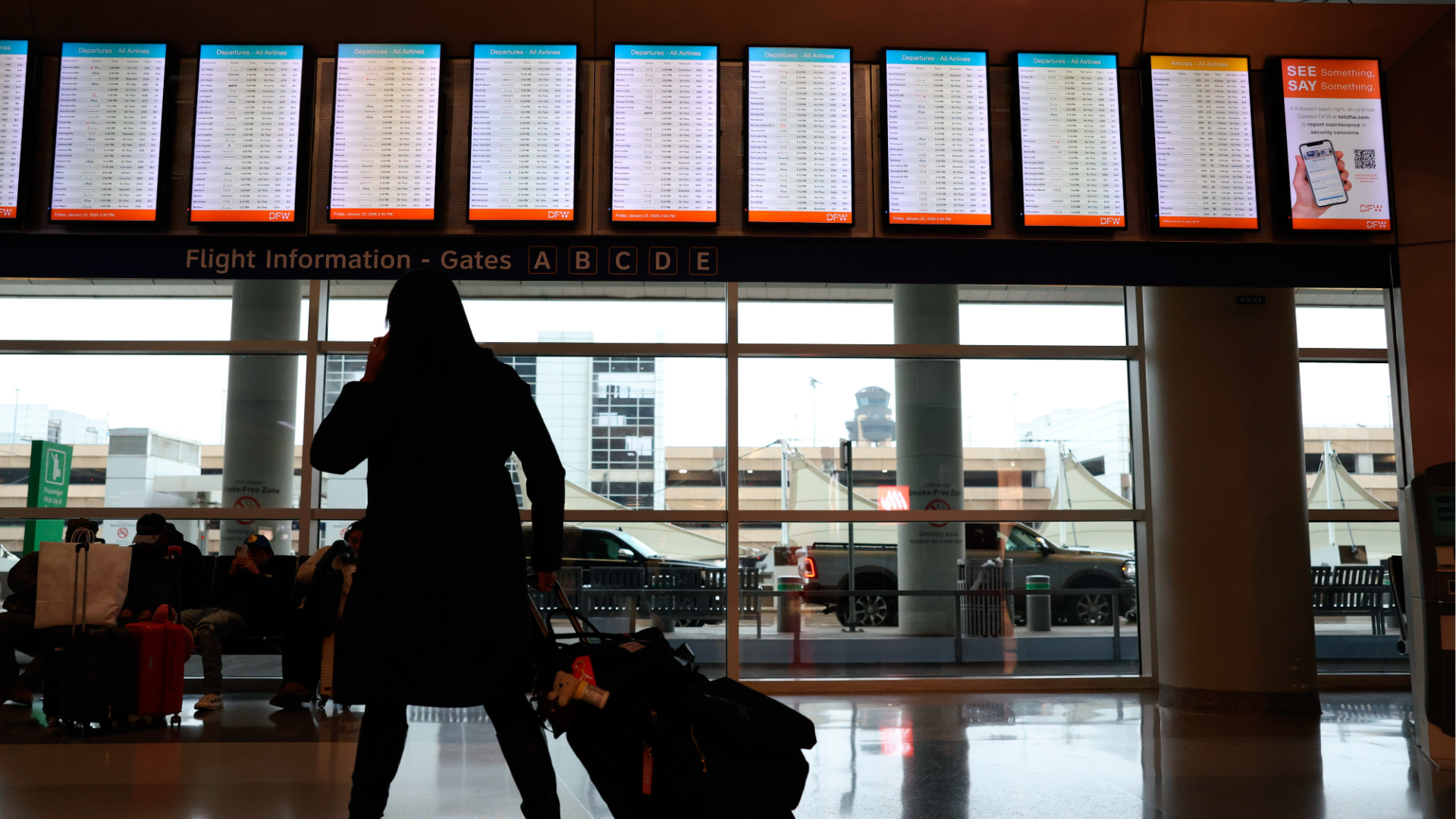 A flight information board at Dallas-Fort Worth International Airport (DFW) ahead of an anticipated winter storm in Dallas, Texas, US, on Friday, Jan. 23, 2026.