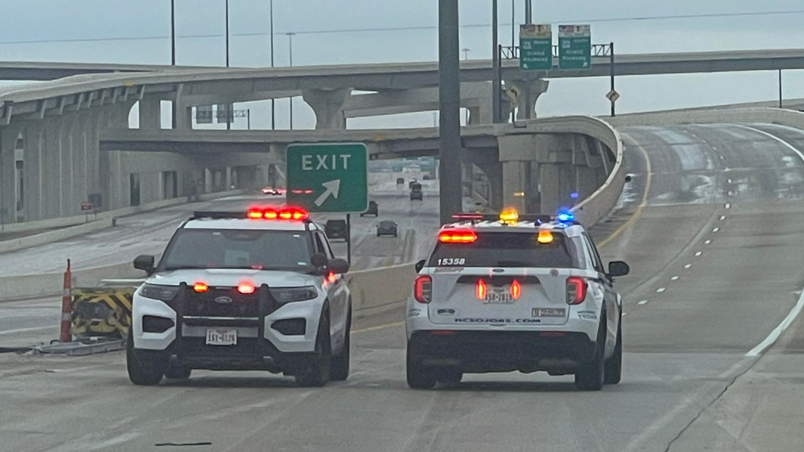 HCSO vehicles blocked inbound and outbound flyovers at the Grand Parkway and Highway 290 amid icy conditions.