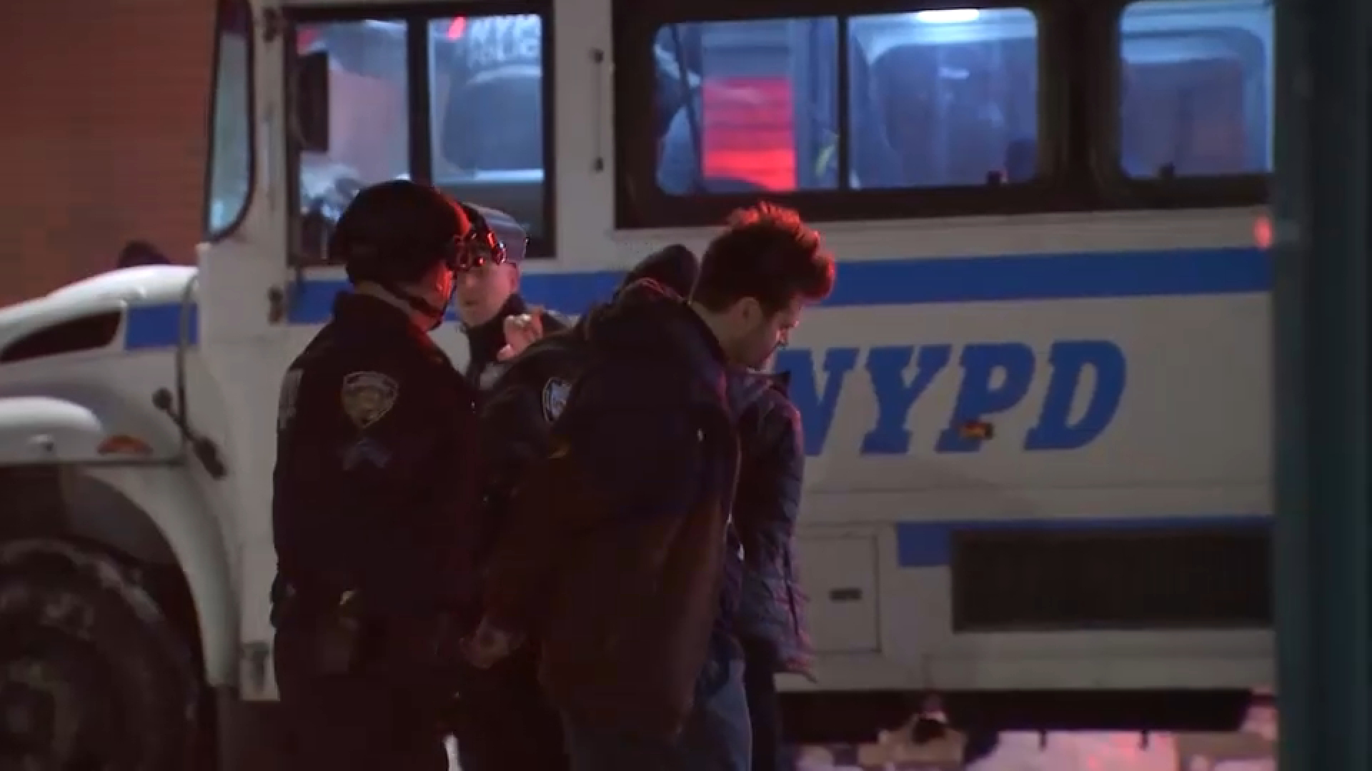 Anti - ICE protest breaks out at Hilton Garden Inn Hotel in Tribeca ; at least 40 people arrested , sources say