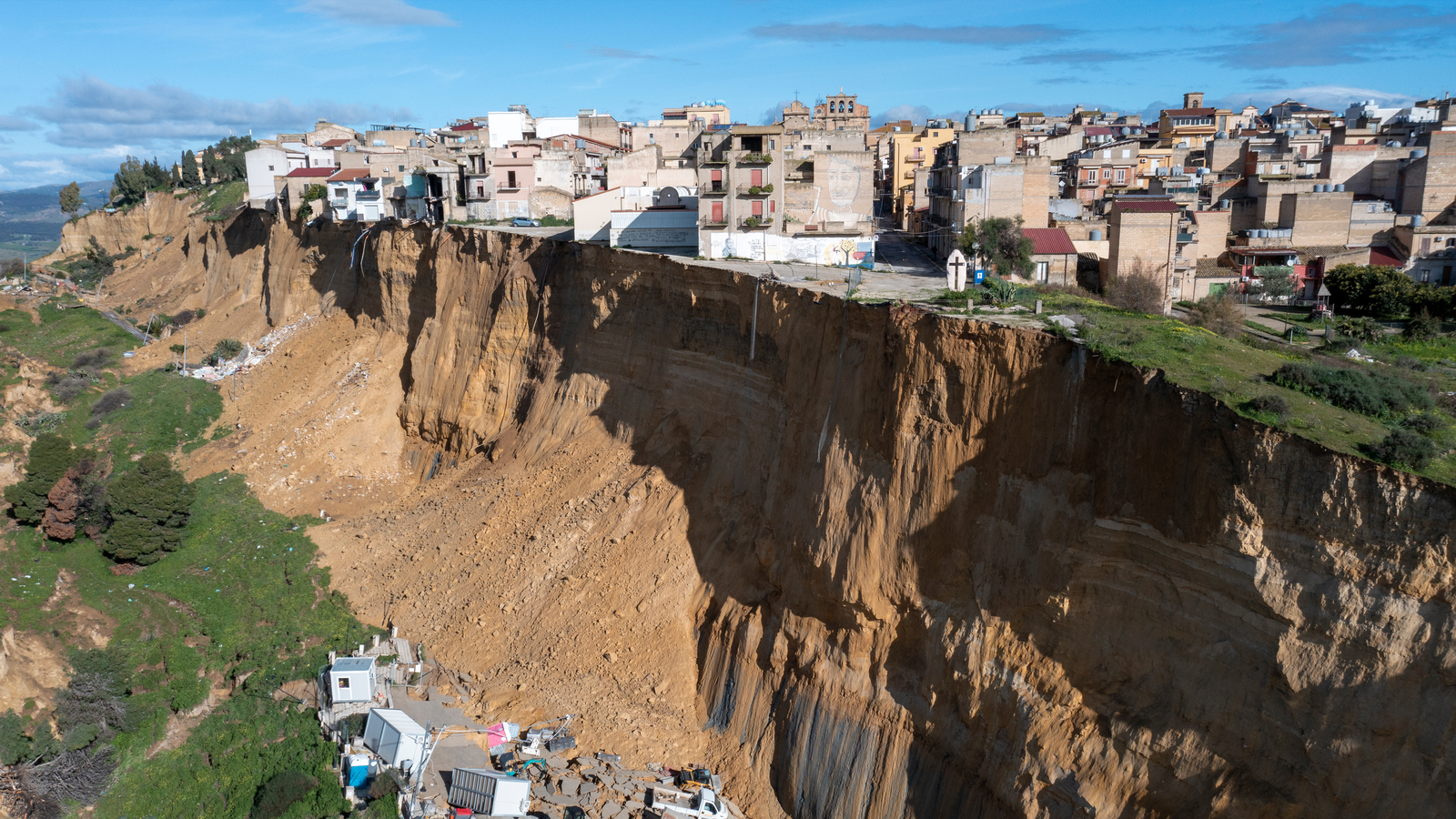Huge landslide leaves Sicilian homes teetering on cliff edge as 1,500 people are evacuated
