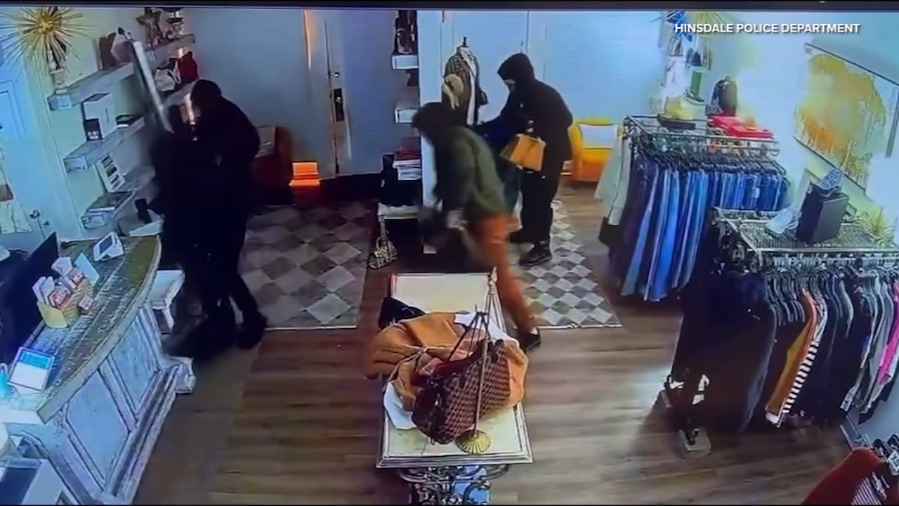 Video shows burglars ransack suburban boutique; 4 suspects in custody