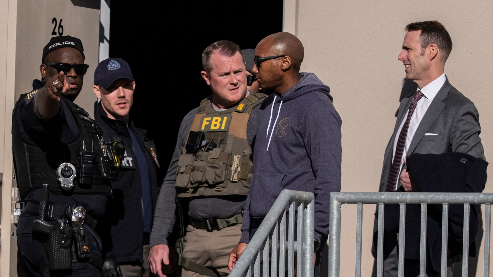 FBI agents are seen at the Fulton County Election Hub and Operation Center, Wednesday, Jan. 28, 2026, in Union City, Ga, near Atlanta.
