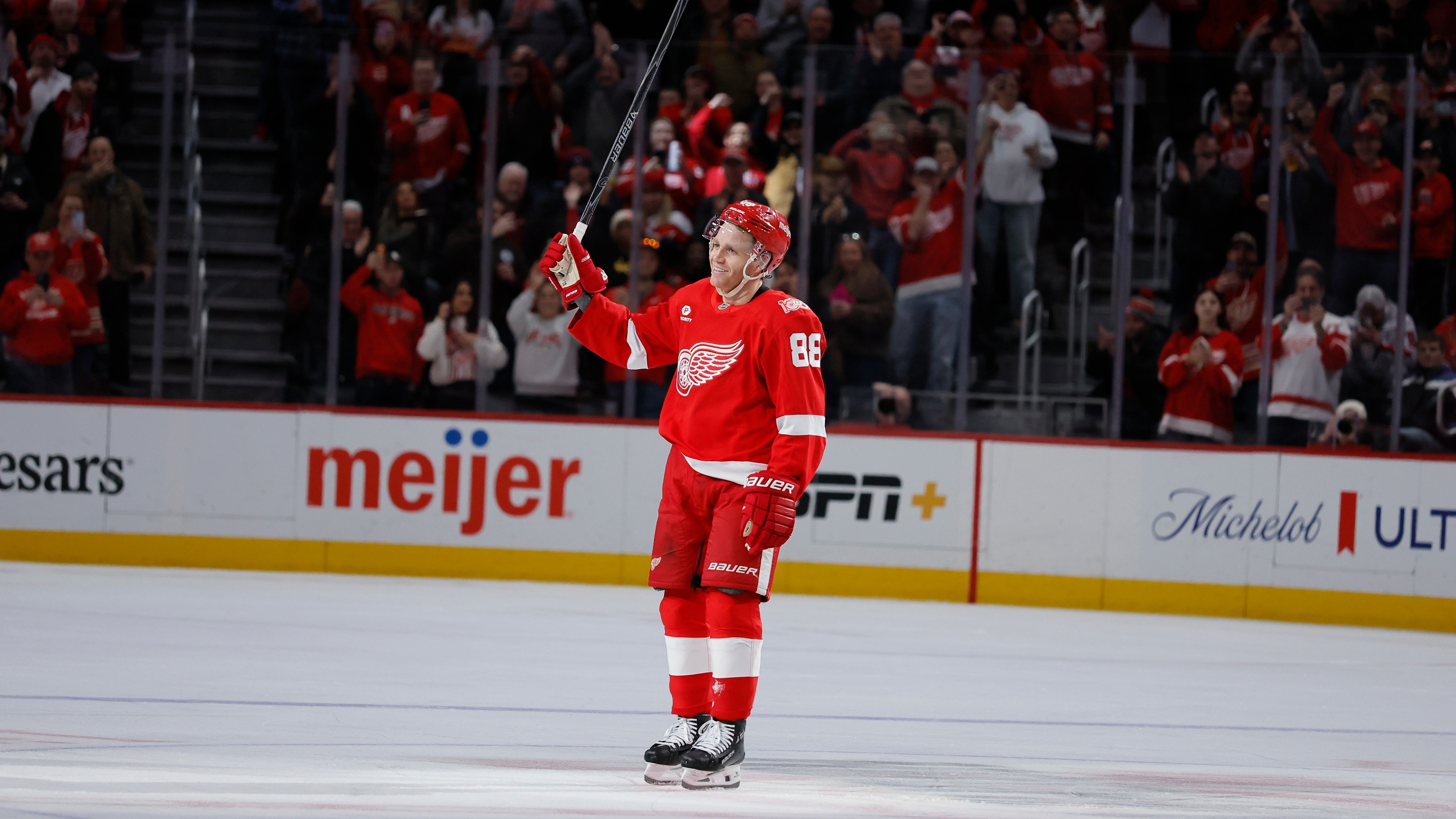 Detroit Red Wings right wing Patrick Kane acknowledges the fans after recording his 1,375th point to break the NHL record for points by a player born in the United States, Jan. 29.