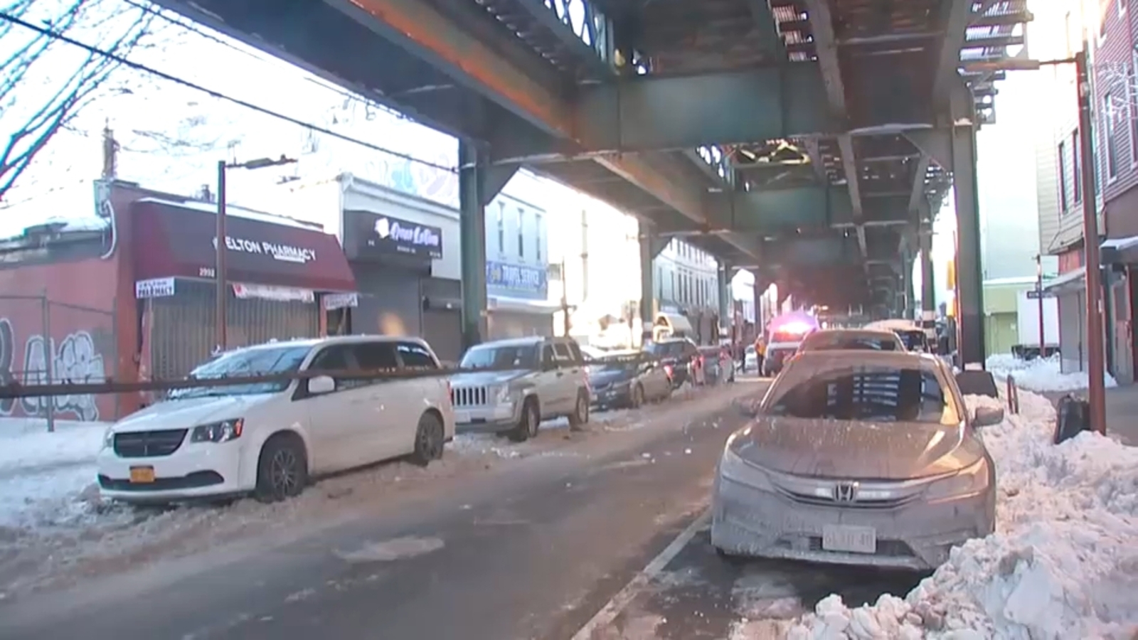 Cold causes cables to fall from elevated subway tracks onto cars below in Brooklyn