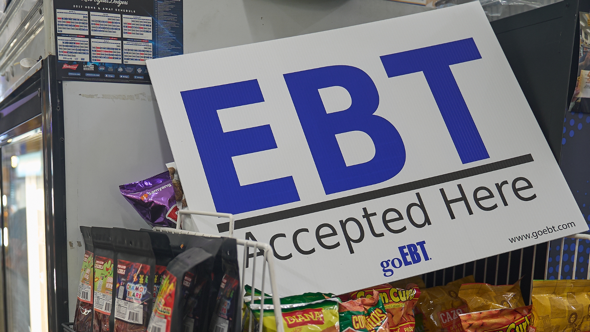 A banner reads: "EBT (Electronic Benefit Transfer) Accepted Here," at El Recuerdo Market in Los Angeles, Friday, Oct. 31, 2025.