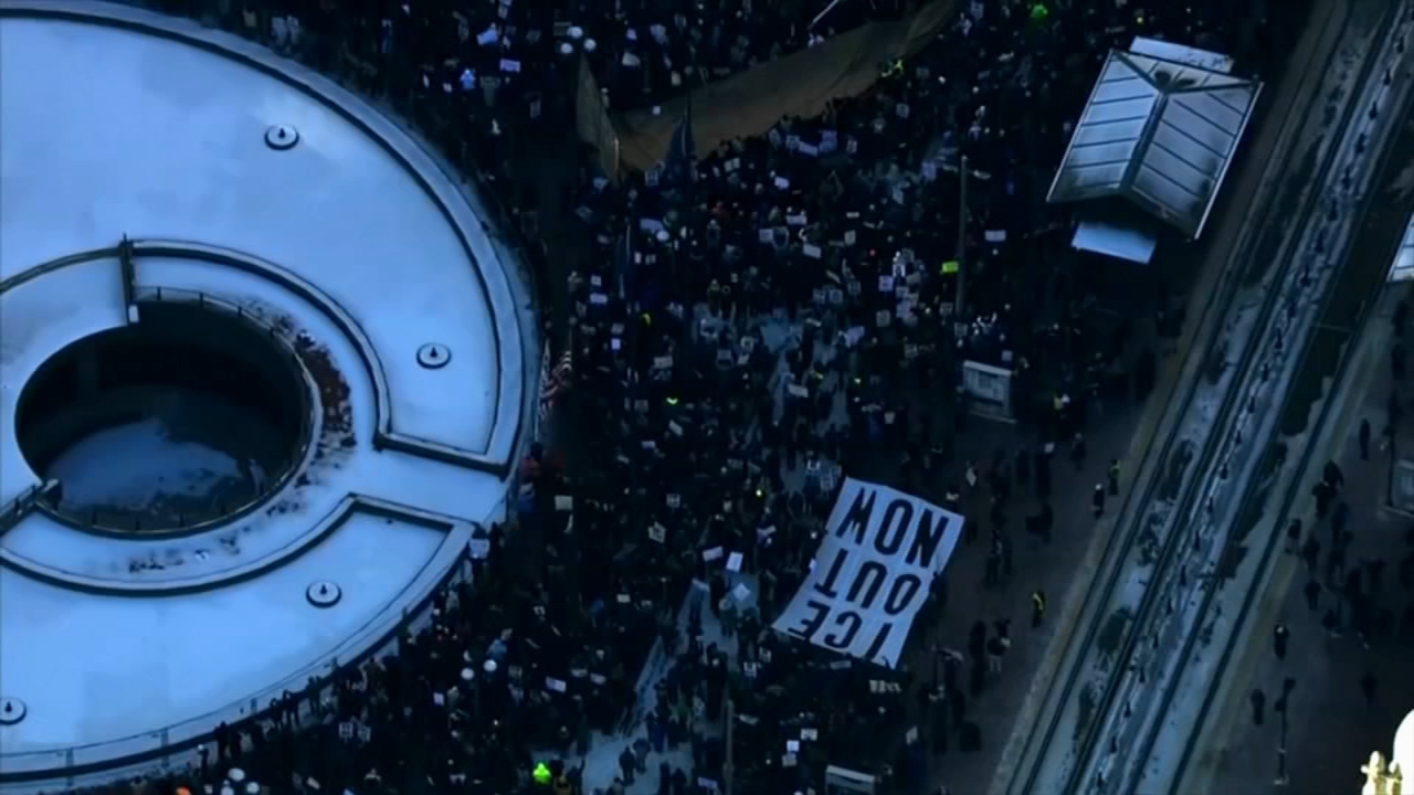 Tens of thousands of people rally across US in coordinated 'ICE Out' protests