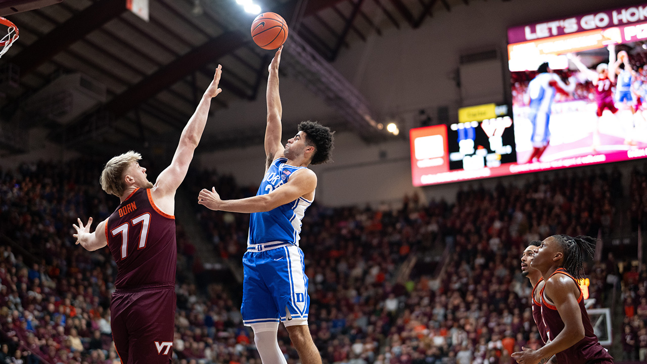 Duke's Cameron Boozer scores over Virginia Tech center Antonio Dorn on Saturday in Blacksburg, Virginia.