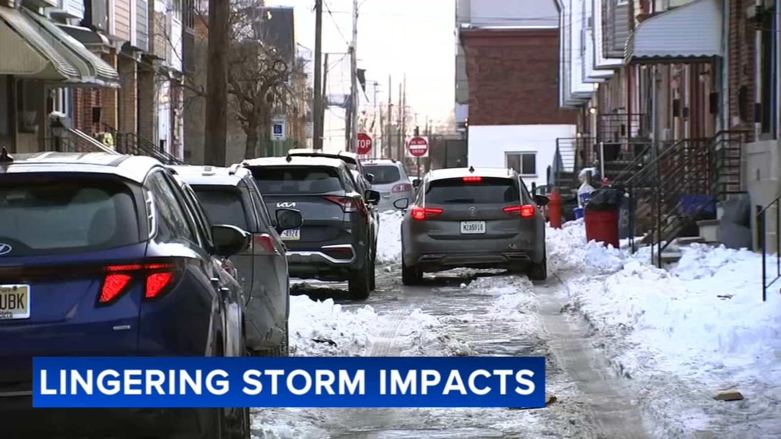 Snow and bitter cold linger on Philadelphia's narrow streets