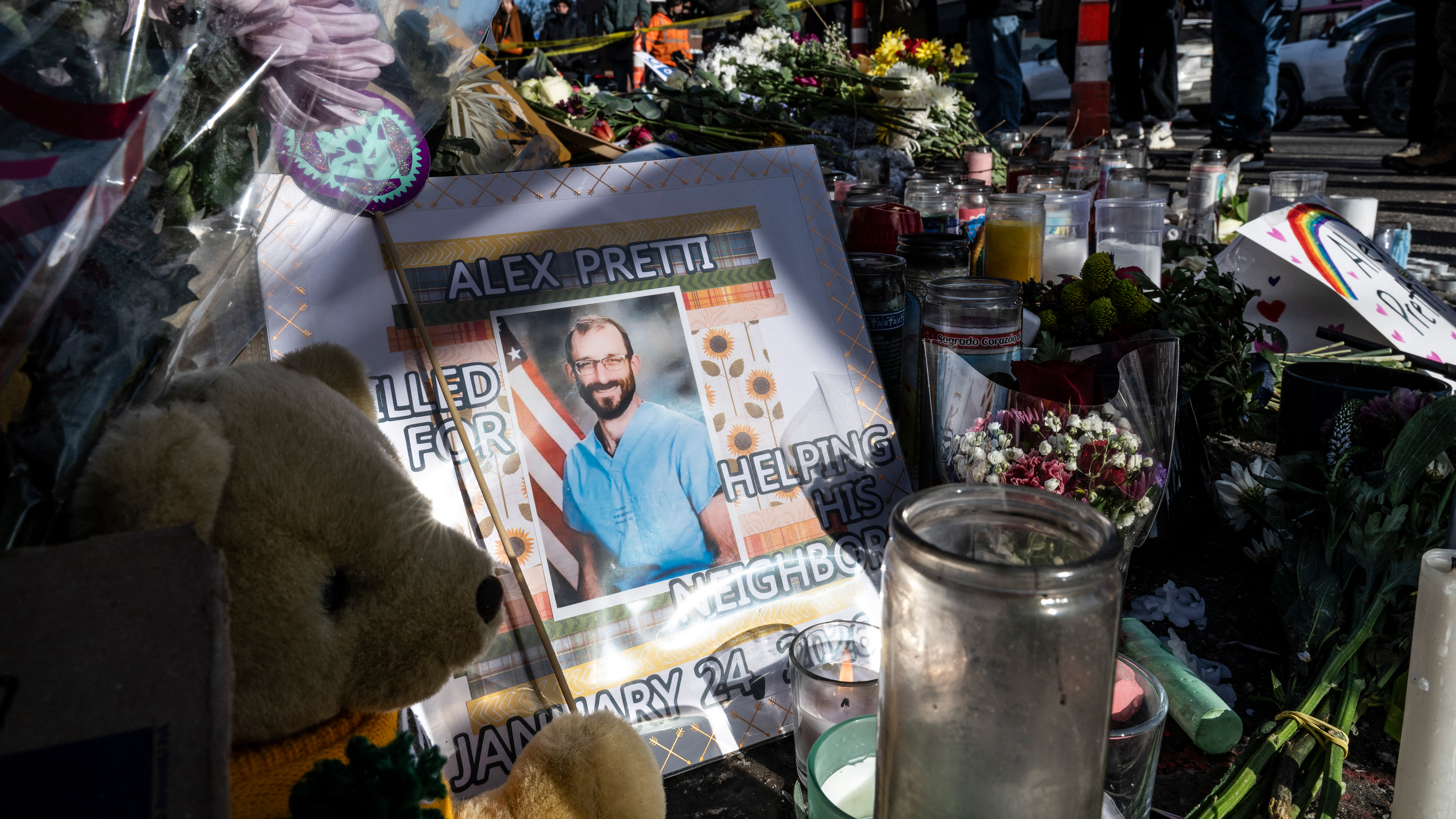 An image of Alex Pretti is seen at a makeshift memorial in the area where he was shot dead in Minneapolis, Minnesota, on January 26, 2026.