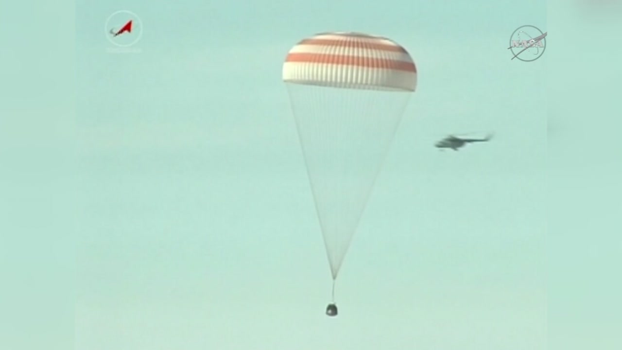 Astronauts return to Earth after 173 days in space