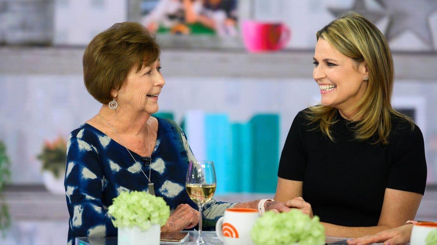 In this image provided by NBCUniversal, Savannah Guthrie, right, her mom Nancy speak, Wednesday, April 17, 2019, in New York.