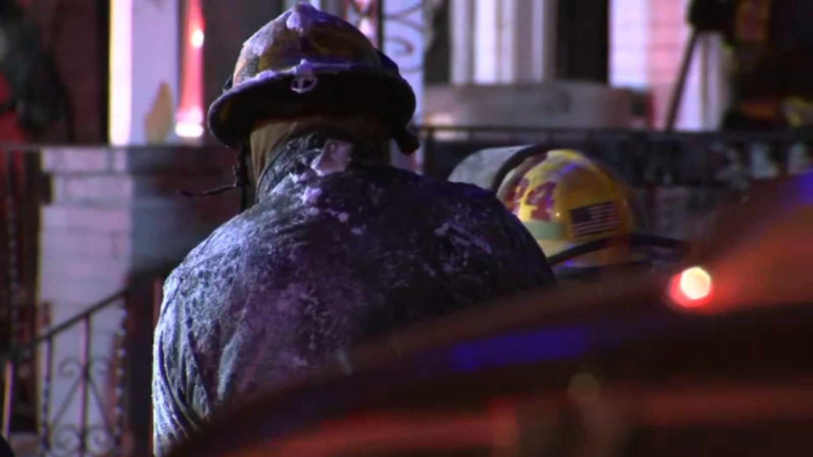Firefighter seen covered in ice while battling West Philadelphia house fire