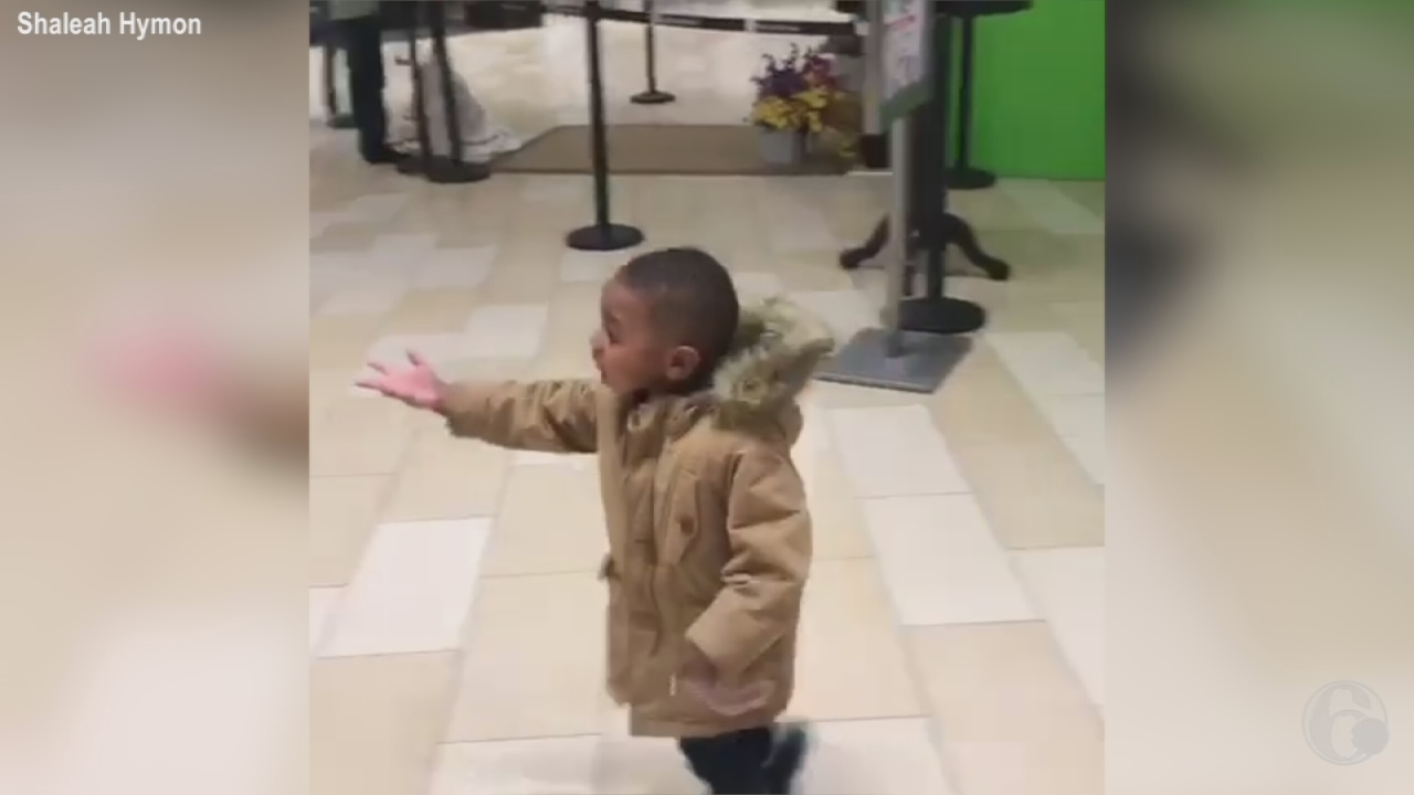 Little boy chases Easter Bunny through Christiana Mall
