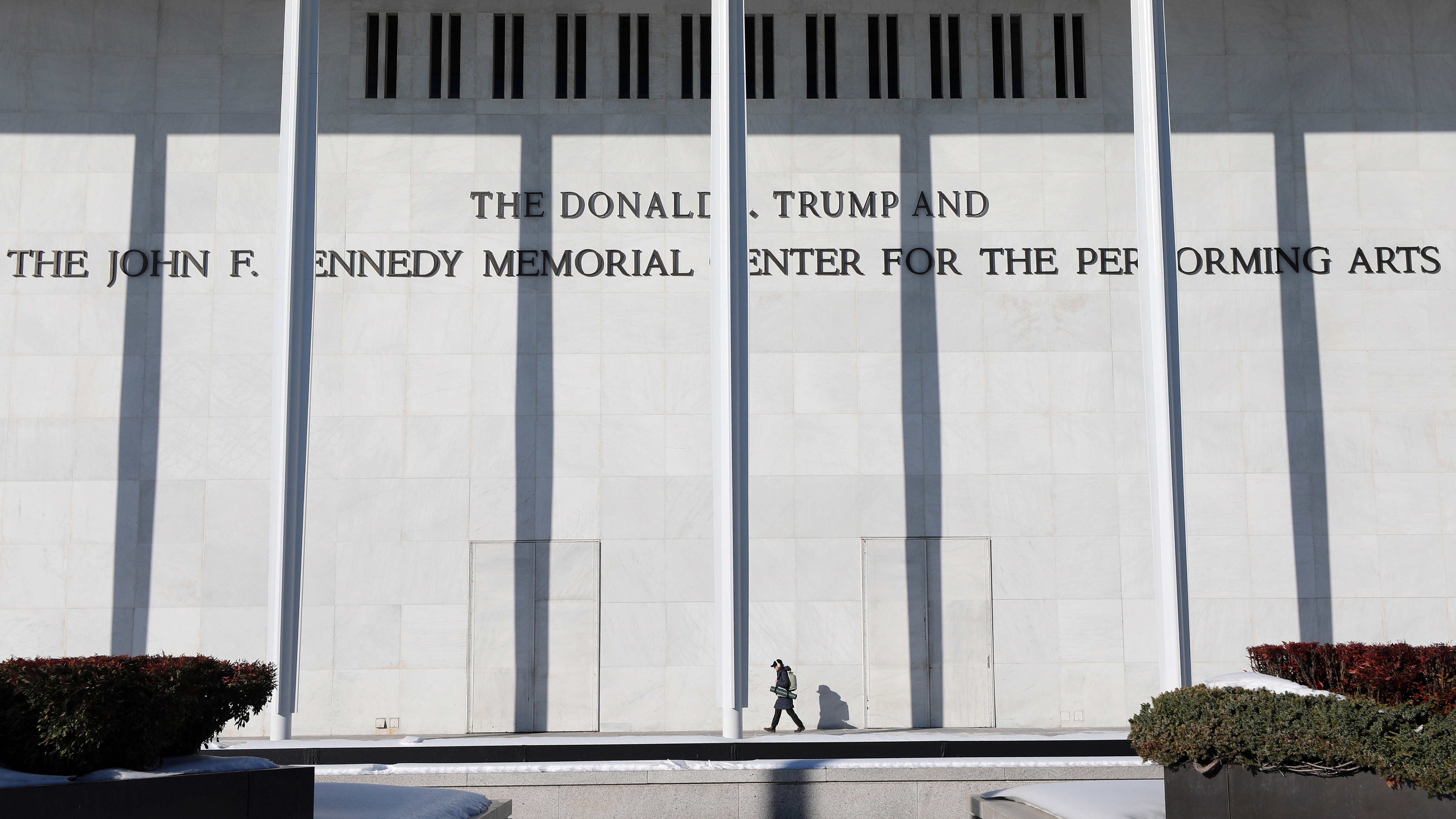 A woman walks outside The John F. Kennedy Memorial Center For The Performing Arts, Monday, Feb. 2, 2026 in Washington. 