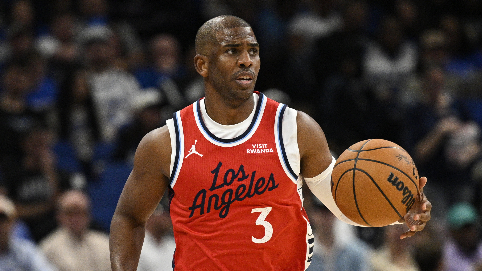 FILE - Los Angeles Clippers guard Chris Paul brings the ball up the court during the first half of an NBA basketball game against the Orlando Magic, Nov. 20, 2025, in Orlando, Fla.