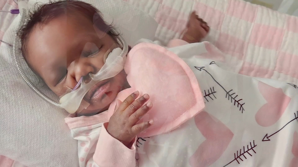 NICU babies show off Valentine's Day outfits